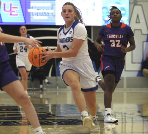 Eastern guard Jordyn Hughes handles the ball in transition in the Panthers game against Evansville on Nov. 20 in Lantz Arena. Hughes scored 10 points and had seven rebounds in the game, which Eastern won 85-74 in double overtime. 