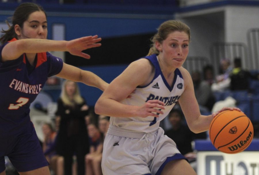 Eastern guard Kira Arthofer drives around a defender in Easterns game against Evansville on Nov. 20 in Lantz Arena. Arthofer had 16 points in the game, which Eastern won 85-74 in double overtime. 