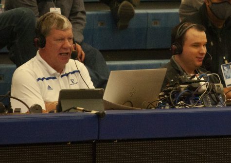 Announcers Bryce Weiler (right) and Mike Bradd call the Eastern mens basketball teams game against SIUE Thursday night on Hit-Mix 88.9. Weiler, who is blind, had been friends with Eastern head coach Marty Simmons since Simmons coached at Evansville when Weiler was a student there. 