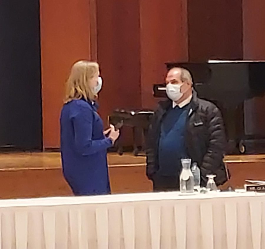 University President David Glassman and BOT Chairperson Joyce Madigan converse following the BOT meeting on Jan. 21.