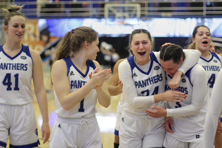 From left Kira Arthofer, a senior guard, and Morgan Litwiller, a junior guard, congratulate Miah Monahan, a freshman guard, on leading the team with 15 points at the women’s basketball game against the Southern Illinois University Edwardsville Cougars on Monday at Lantz Arena. The Panthers won 89-65 against the Cougars.  
