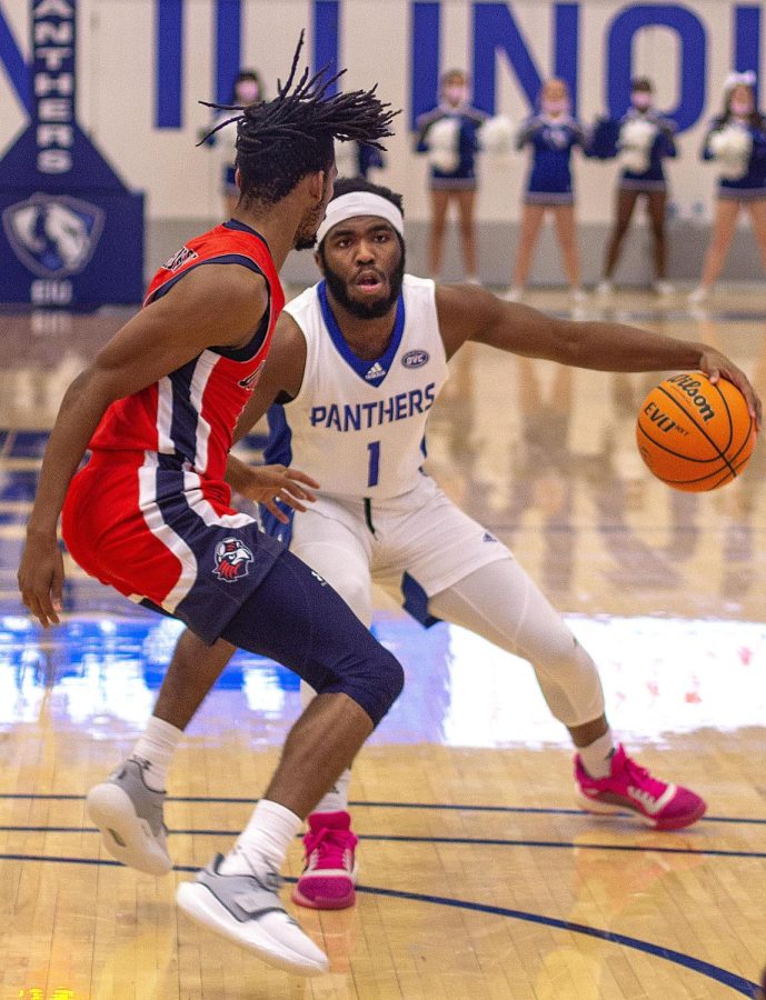 Eastern guard Kashawn Charles tries to dribble around a defender in the Panthers game against Tennessee-Martin on Feb. 12 in Lantz Arena. Charles had a career-high 27 points in the game, which Eastern won 82-70.