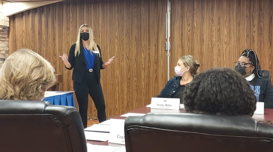 Haylee Brickey, a senior public relations major and chair of the University Board, presents to Student Senate explaining what the University Board plans to use the requested $34K for on Wednesday.