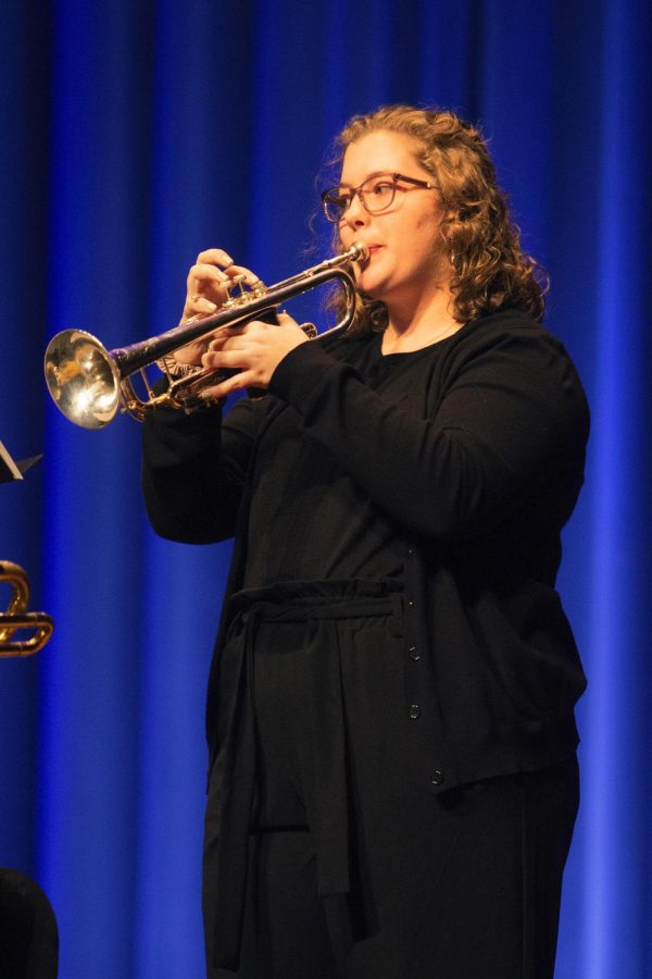 A member of the Jazz Lab Band plays the trumpet during Tuesday night’s performance in Doudna Fine Arts Centers Black Box Theatre.