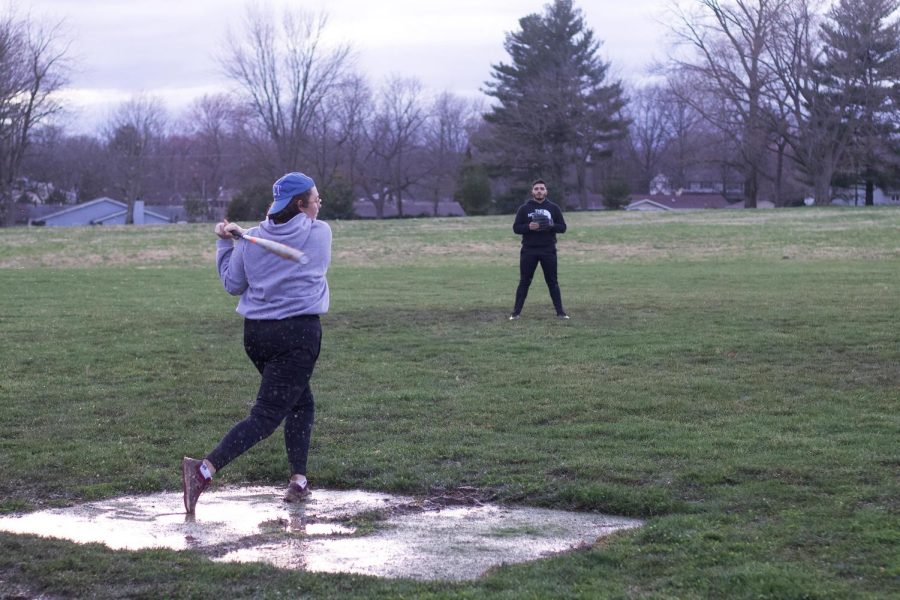 Students compete against each other for the Greek Life softball game for SigFest week hosted by Sigma Chi Fraternitys President, Bryden Brown, a senior exercise science major on Thursday evening, March 24, 2022, at Eastern Illinois University in Charleston, Ill.