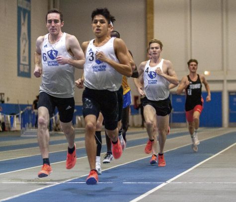 Members of the Eastern track team compete in the men’s mile at the John Craft Invitational on Jan. 15, 2022 in the Lantz Field House. Eastern’s Jamie Marcos (3) finished the race with a time of 4:12.83, placing first out of 18 runners. 