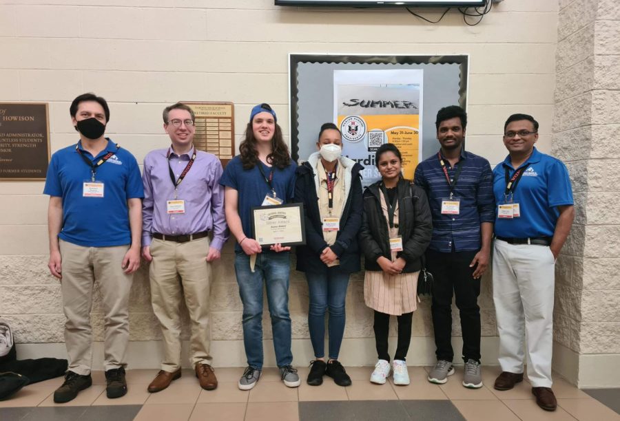 Easterns Robotic Team #2 won second place in the Sumo Robot Contest at the National Robotics Competitions on April 7 to April 9 in Marion, Ohio. Pictured from left to right, is Wutthigrai Boonsuk, an advisor of the robotics teams and associate professor in the School of Technology, Jason Duhamell, Team #1s team captain and a management information systems major, Ian Centers, Team #2s team captain and a engineering technology major, Aleigh Crowder, member of Team #2 and a biological sciences major, Srilekha Poli, member of Team #2 and a technology major, Sri Sai Balu Rocharla, a member of Team #1 and a technology major, and Toqueer Israr, an advisor of the robotics teams and an associate professor in the School of Technology.