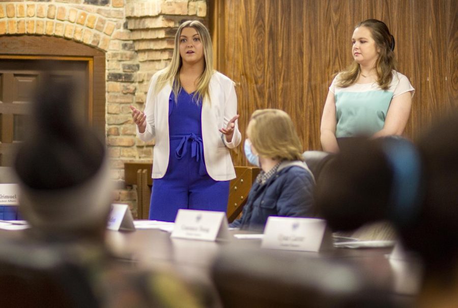 From left, Eastern University Board President Haylee Brickey, a senior public relations major, and Holly Olson, a senior management major, present the University Board budget for 2022-2023 Wednesday night during the Student Senate meeting at 7th Street Underground.