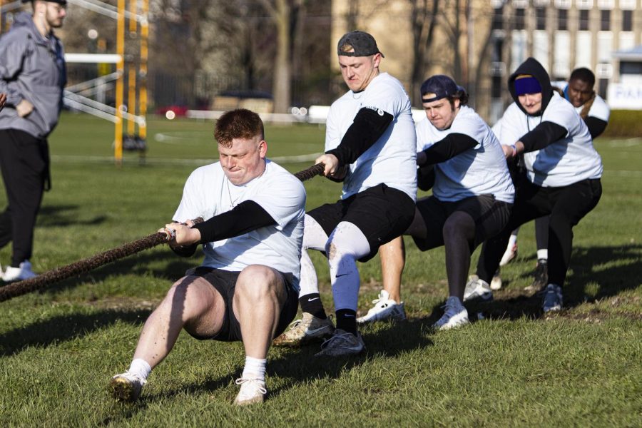 Members of the Sigma Alpha Epsilon Fraternity Inc., work as a team to defeat their opponents at the Tugs event for Greek Week on Monday evening at the Campus Pond on April 18, 2022 at Eastern Ilinois University in Charleston, Ill.