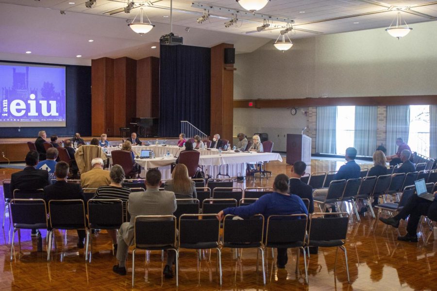 Eastern Illinois Universitys Board of Trustees votes on action items during the Friday meeting in the Grand Ballroom.