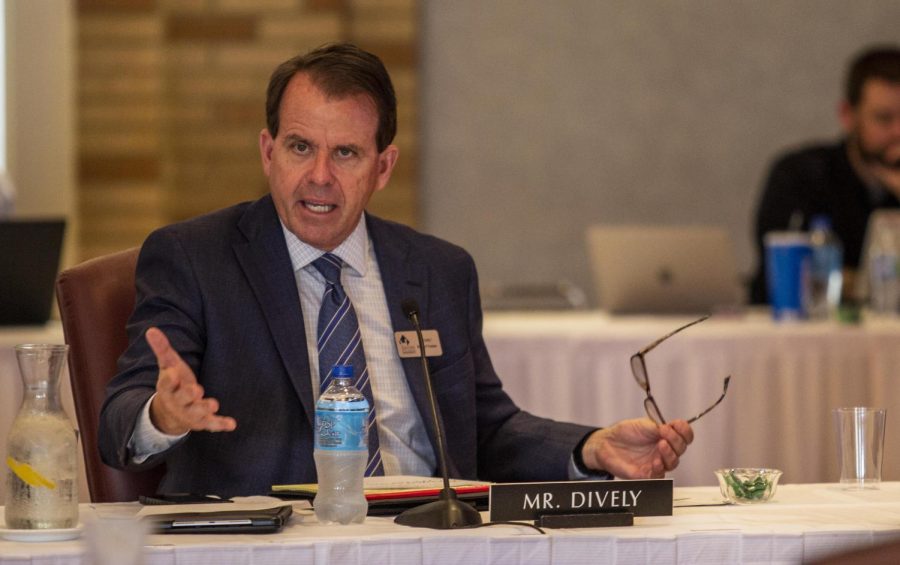 Joseph Dively adds his input to the topic of the Douglas Hall rename during the Board of Trustees meeting Friday in the Grand Ballroom.