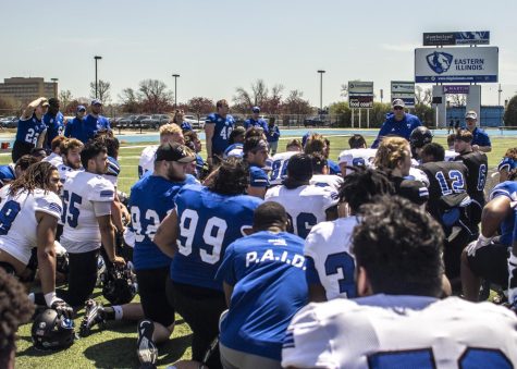 Eastern Head Football Coach Chris Wilkerson talks to the team after the Alumni Social Spring Game Saturday afternoon at OBrien Field. Wilkerson said he was impressed with the teams energy and enthusiasm, feeling the whole effort put forth as a team.