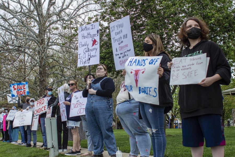 Coles Progressives, community members and students at Eastern  rally as one and protest against the U.S. Supreme Court draft opinion potentially indicating support for overturning Roe v. Wade Friday at noon at Morton Park.