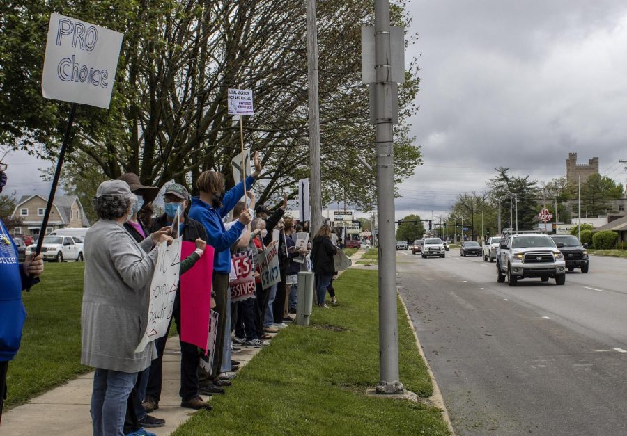 Protesters were honked at, heckled and rained on during their protest against the U.S. Supreme Court draft opinion potentially indicating support for overturning Roe v. Wade Friday at noon at Morton Park at Lincoln Ave.