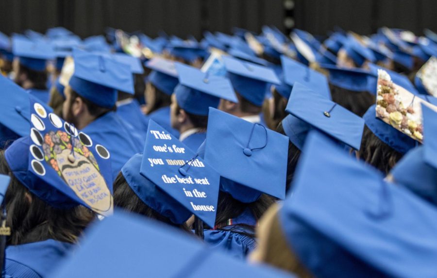 Many students decorated their graduation caps with messages, graphics, picture collages and other meaningful displays for their graduation ceremony on Saturday afternoon in Lantz Arena.