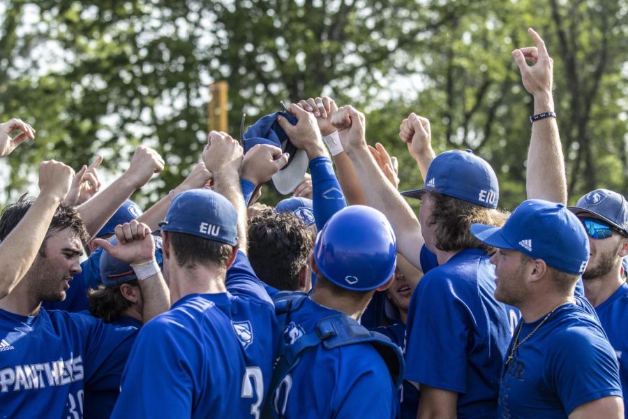 The Panthers celebrate after winning their last conference game of the season on Friday. The Panthers won one game of the doubleheader, against the Southeast Missouri Redhawks 7-5.