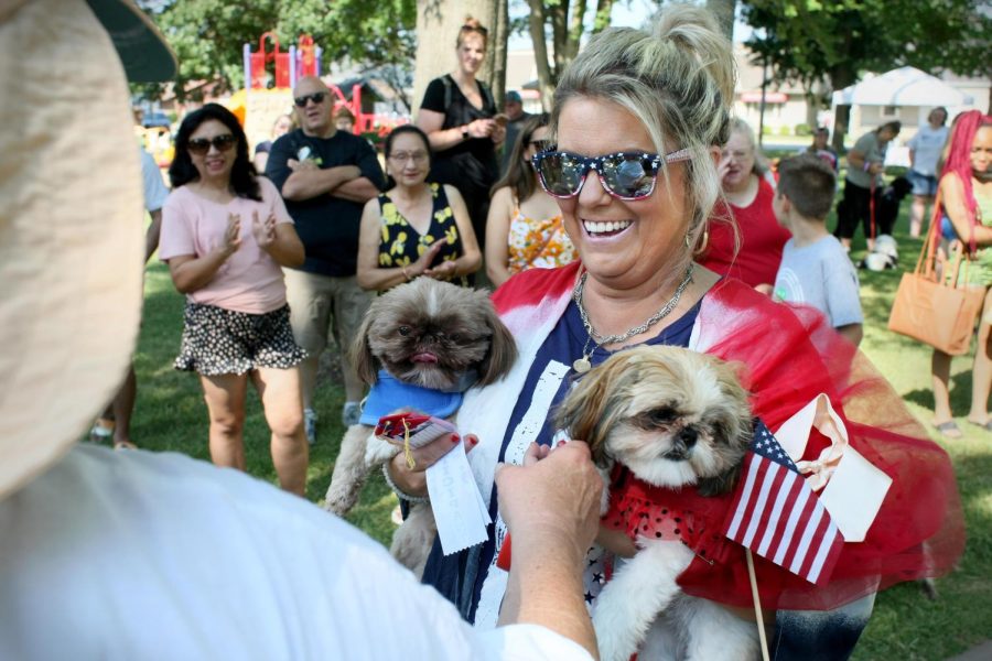 More than 20 pet owners participated in the Red, White and Blue Days Pet Parade at Morton Park on Monday.