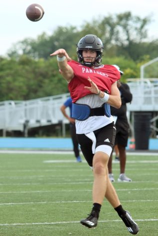 Redshirt sophomore quarterback Jonah OBrien throws the ball during a practice drill Monday afternoon at OBrien Field.