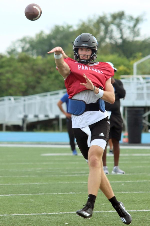 Redshirt sophomore quarterback Jonah OBrien throws the ball during a practice drill Monday afternoon at OBrien Field.