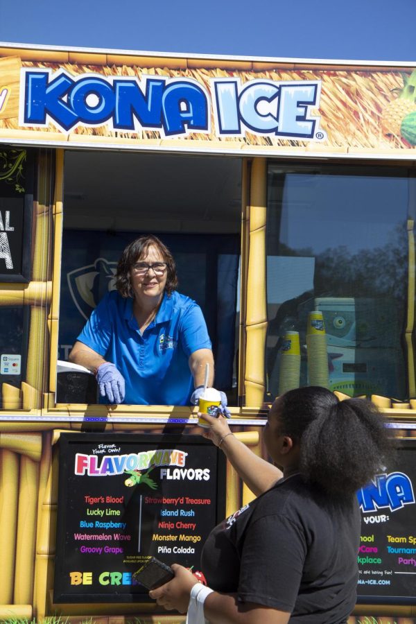 The Kona Ice truck hands out shaved ice to students in front of the Martin Luther King Jr. University Union during Pantherpalooza Tuesday afternoon.