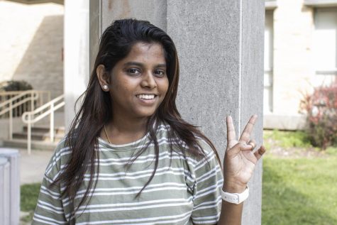 Susmitha Murugan, a graduate student stuyding technology, poses for a picture near Lumpkin Hall Friday afternoon.