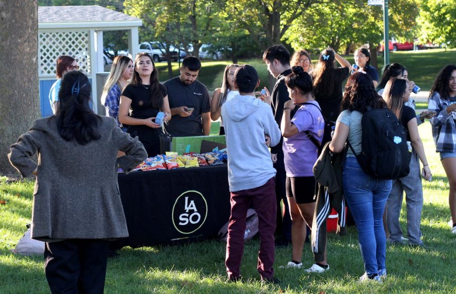 Students gather in the Library Quad Thursday afternoon to socialize and meet one another during the a Latinx social event sponsored by Easterns Latin American Student Organization.