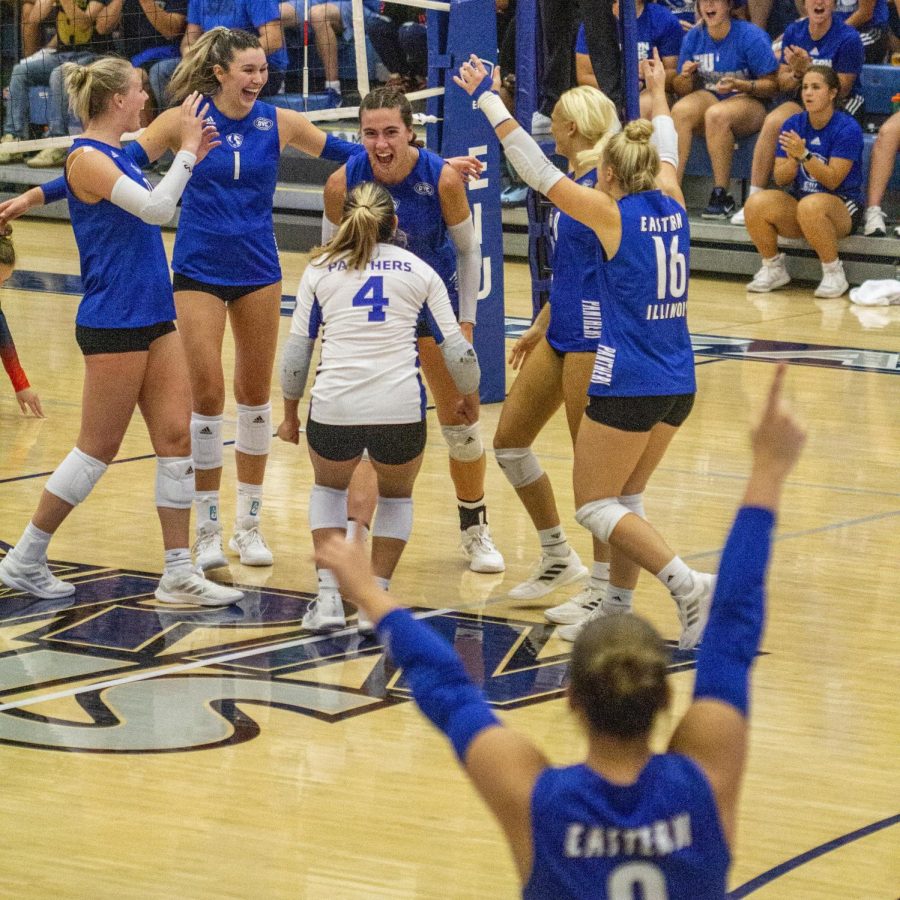 Members of the volleyball team regroup and celebrate scoring a point during the volleyball game against the Illinois State University Redbirds at Lantz Arena Wednesday evening. The Panthers lost 3-0 to the Redbirds.