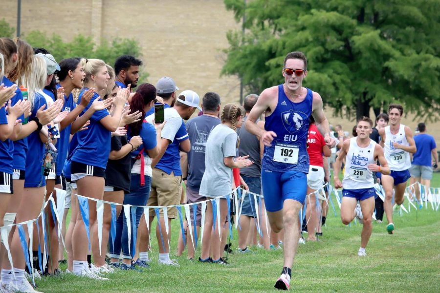 Josh+Whitaker%2C+a+graduate+student+studying+exercise+science%2C+makes+a+dash+for+the+last+stretch+in+the+Walt+Crawford+Open+Friday+afternoon+at+the+Panther+Trail.+Whitaker+finished+fourth+in+the+race+with+a+time+of+25%3A44.7+with+an+average+mile+time+of+5%3A10.8.