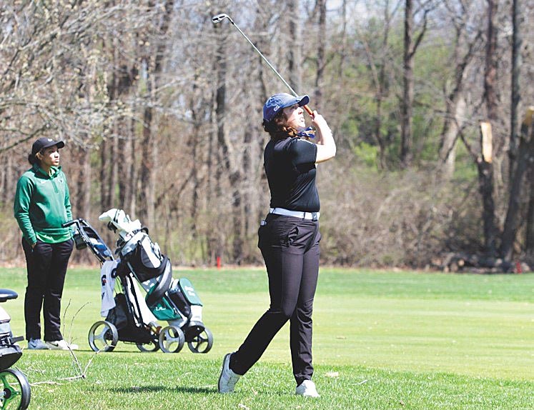 Isabel Spanburg, a junior majoring in Biological Sciences, watches her shot during the Indiana State Invite at the Country Club of Terre Haute in Terre Haute, Indiana, on April 3, 2022. Spanburg finished the invite in 50th place, shooting a 36-hole total of 183. 