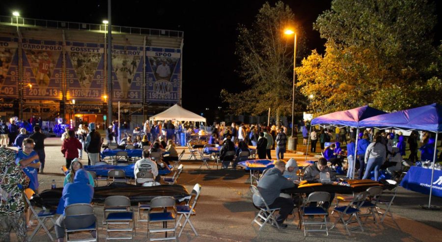 Students and alumni crowded outside O’Brien Field Friday night to celebrate homecoming at a block party that included live music, food trucks, a beer garden and game and giveaways.