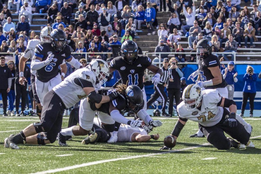 Players on both teams, the Panthers and Lions, scramble after a ball was fumbled during the homecoming football game against the Lindenwood Lions at OBrien Field Saturday afternoon. The Panthers lost 37-34 to the Lindenwood Lions in a double overtime.