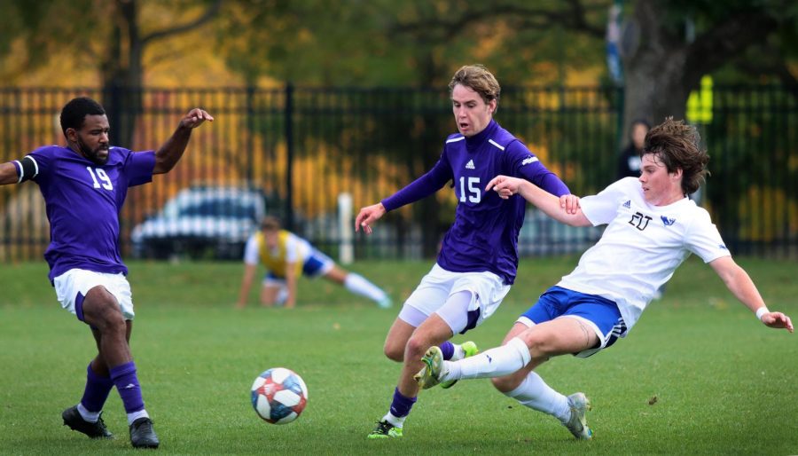 Number 20, Casey Welage (right), a freshman forward slide kicks the ball away from Western Illinois University players Xavier Brown (19), graduate midfielder and forward, and Oscar Olingdahl (15), a freshman midfielder, during the mens soccer game at Lakeside Field Saturday morning. Wellage had 1 assist. The Panthers tied 1-1 against the Leathernecks.