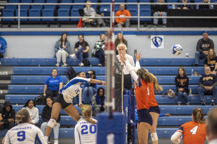 Giovana Larregui Lopez, a junior outside hitter, jumps to spike the ball during the volleyball of the second set of the first game against the UT Martin Skyhawks at Lantz Arena Friday afternoon. Lopez had 24 kills, 5 kills, and scored 27 points. The Panthers won 3-2 against the Skyhawks.