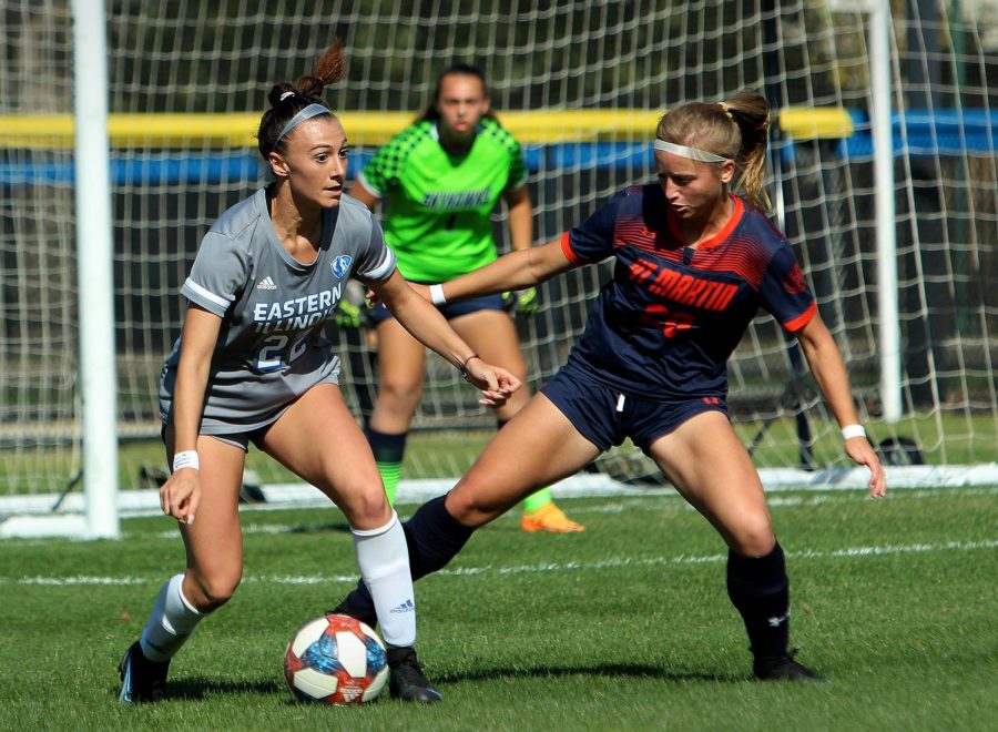 Number 22 Nicoletta Anuci, a senior midfielder, dribbles the ball while attempting to retain possession from UT Martins number 20 Shayla Addington, a freshman defender, in the Skyhawks defensive zone during the womens soccer Senior Day game at Lakeside Field Sunday afternoon. Anuci had 1 shot. The Panthers and Skyhawks tied 1-1. 