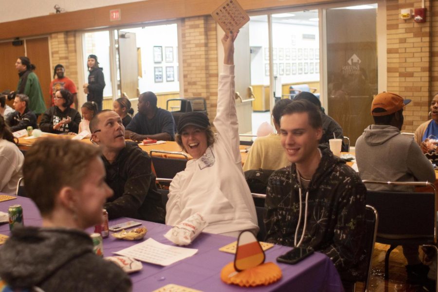 Amy Brajkovic wins in a game of bingo at the family bingo night in the Grand Ballroom of Martin Luther King Jr. University Union.
