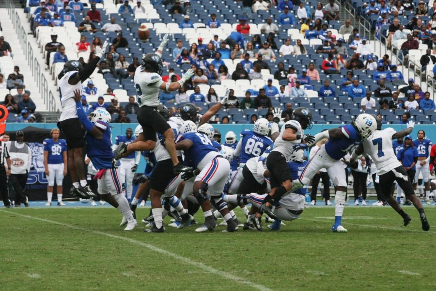 The Panthers defensive line jump in an attempt to block the incoming field goal from the Tigers from Tennessee State at the Nissan Stadium. The Panthers lost to the Tigers 37-17 on Saturday afternoon.