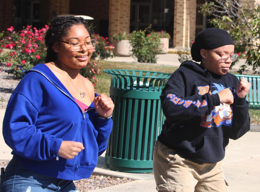 Tatyana Phillips, a sophomore majoring in pre-veterinary medicine, (left) and Naomi Wright-Allen, a sophomore majoring in nursing, (right) dance at the
Library Quad at the Homecoming Kickoff on Monday afternoon.