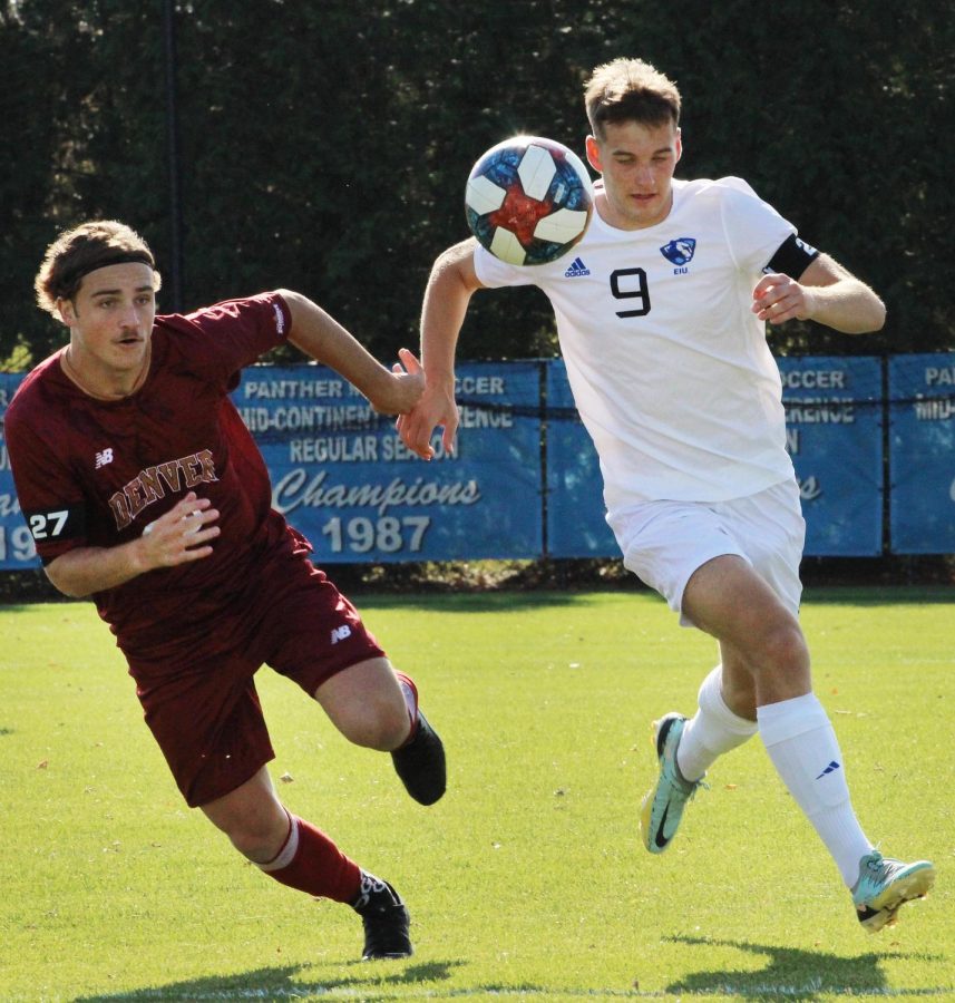Sam Eccles (9), a forward, takes the ball down field at Lakeside Field vs. Denver University. The Panthers lost 3-0 to the Pioneers Saturday afternoon.