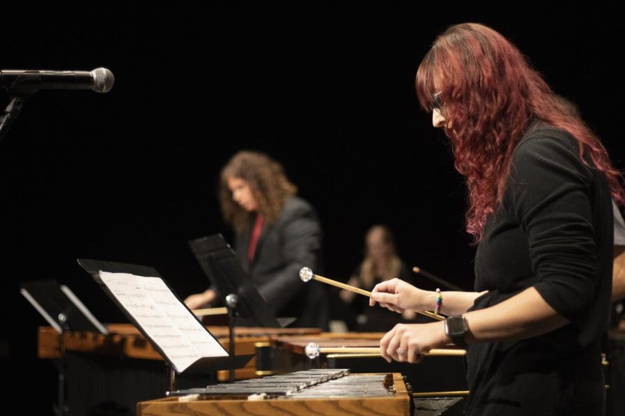 Cheyenne Brickner performs in the piece Numerology by Brian Nozny with the rest of the percussion ensemble personnel in the Black Box Theatre of Doudna Fine Arts Center Tuesday night.