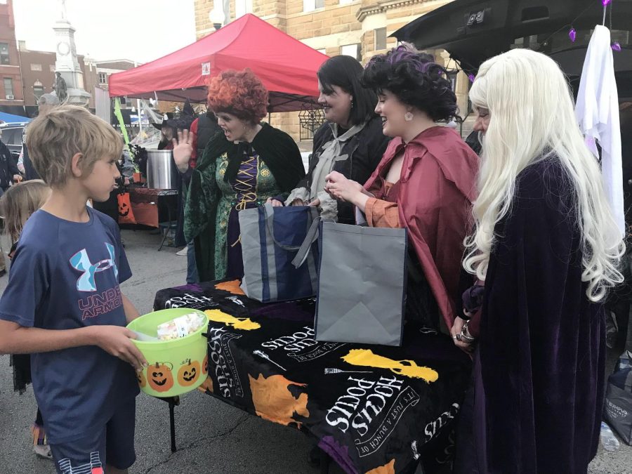 At Scare on the Square, a group dresses up as characters from the movie Hocus Pocus and hands out bags full of candy Saturday afternoon.