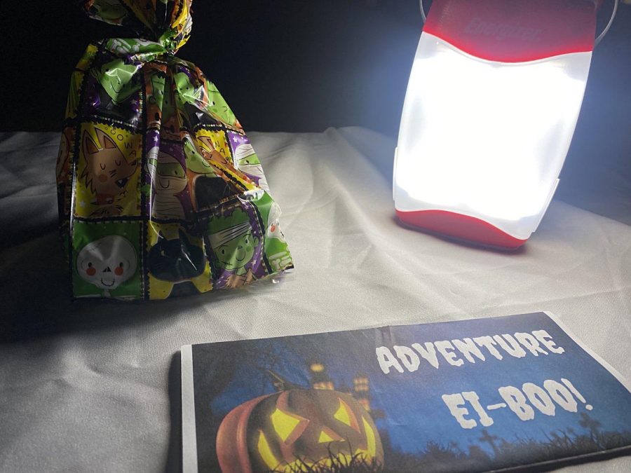 A bag of candy was offered to participants at the end of the Adventure EI-Boo scavenger hunt Saturday night.