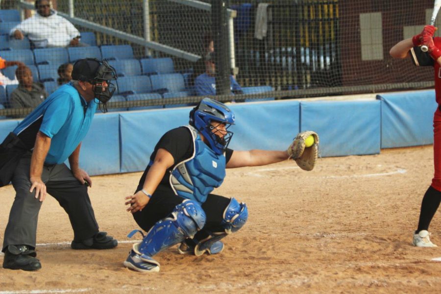 An Eastern softball member catches the ball at their game against Lake Land college Wednesday evening at the Williams Field.