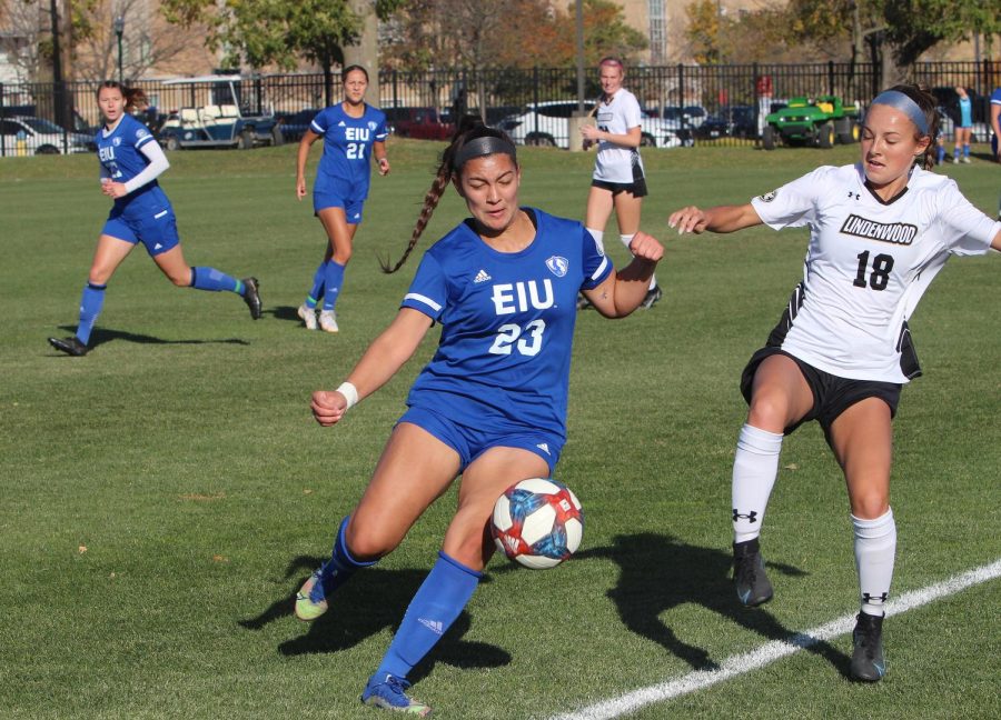 Eastern player, number 23 Kya Trejo, takes the ball downfield against Lindenwood player, number 18 Peyton Ganz. The Panthers and Lions tied 0-0 Thursday afternoon Oct. 20, 2022, at Lakeside Field on Eastern Illinois Universitys campus in Charleston, Ill. 