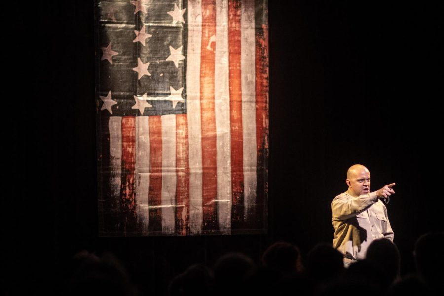 Douglas Taurel opens his one-man production called The American Soldier by calling the audiences attention by simulating the military in The Black Box Thursday evening in the Doudna Fine Arts Center. Through his show, Taurel unveils struggles that soldiers and veterans face when returning to society after battle.