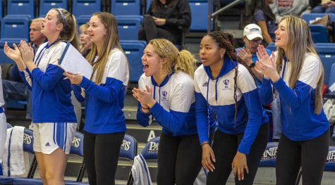 The womens basketball team cheers for fellow players after scoring during the womens basketball game against the Rowdy Raiders at Lantz Arena Monday afternoon. The Panthers won 96-67 against the Rowdy Raiders. The Panthers have won seven games in row.