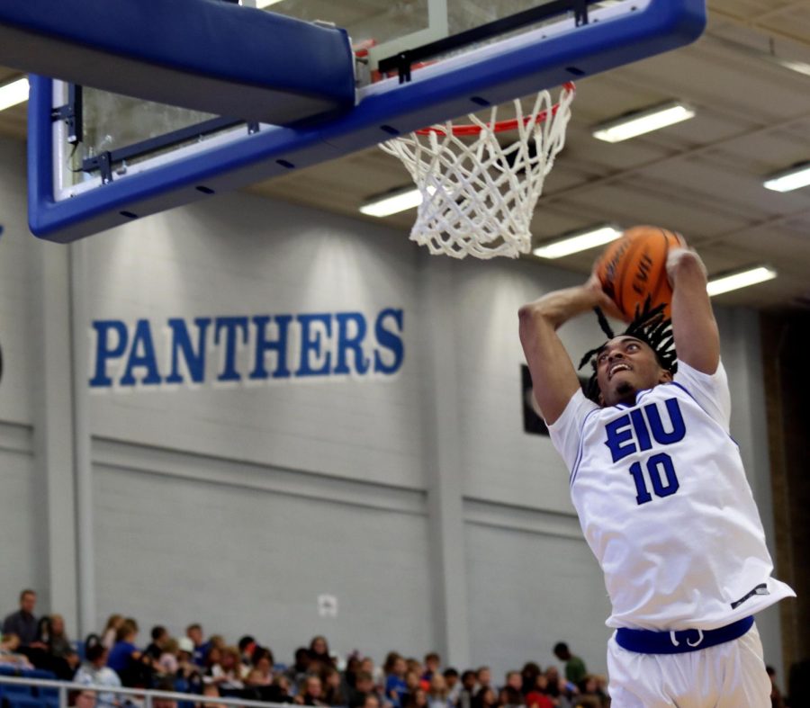 Kinyon Hodges (10), a junior guard, dunks the ball during the mens basketball game against the St. Mary of the Woods College Black Horses in Lantz Arena Monday afternoon. Hodges scored 15 points, six rebounds, and had four assists.. The Panthers won 102-40 against the Black Horses. 