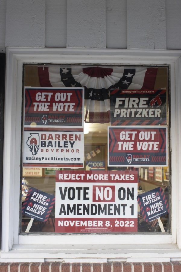 The outside of the Republican headquarters is filled with signs on Election Day.