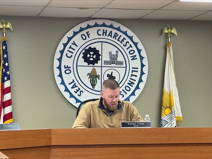 Charleston Mayor Brandon Combs reads over an agenda item during the City Council meeting Tuesday evening at City Hall.