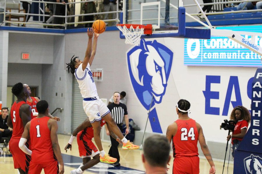 Eastern guard, Kinyon Hodges (10), attempts a dunk against Ball State in Lantz Arena on Wednesday night. The Panthers lost to the Cardinals 76-59.