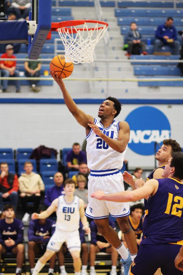 Eastern guard, Caleb Donaldson (20), jumps up to attempt a layup against the Western Illinois Leathernecks Saturday afternoon in Lantz Arena. The Panthers lost 79-75 to the Leathernecks.